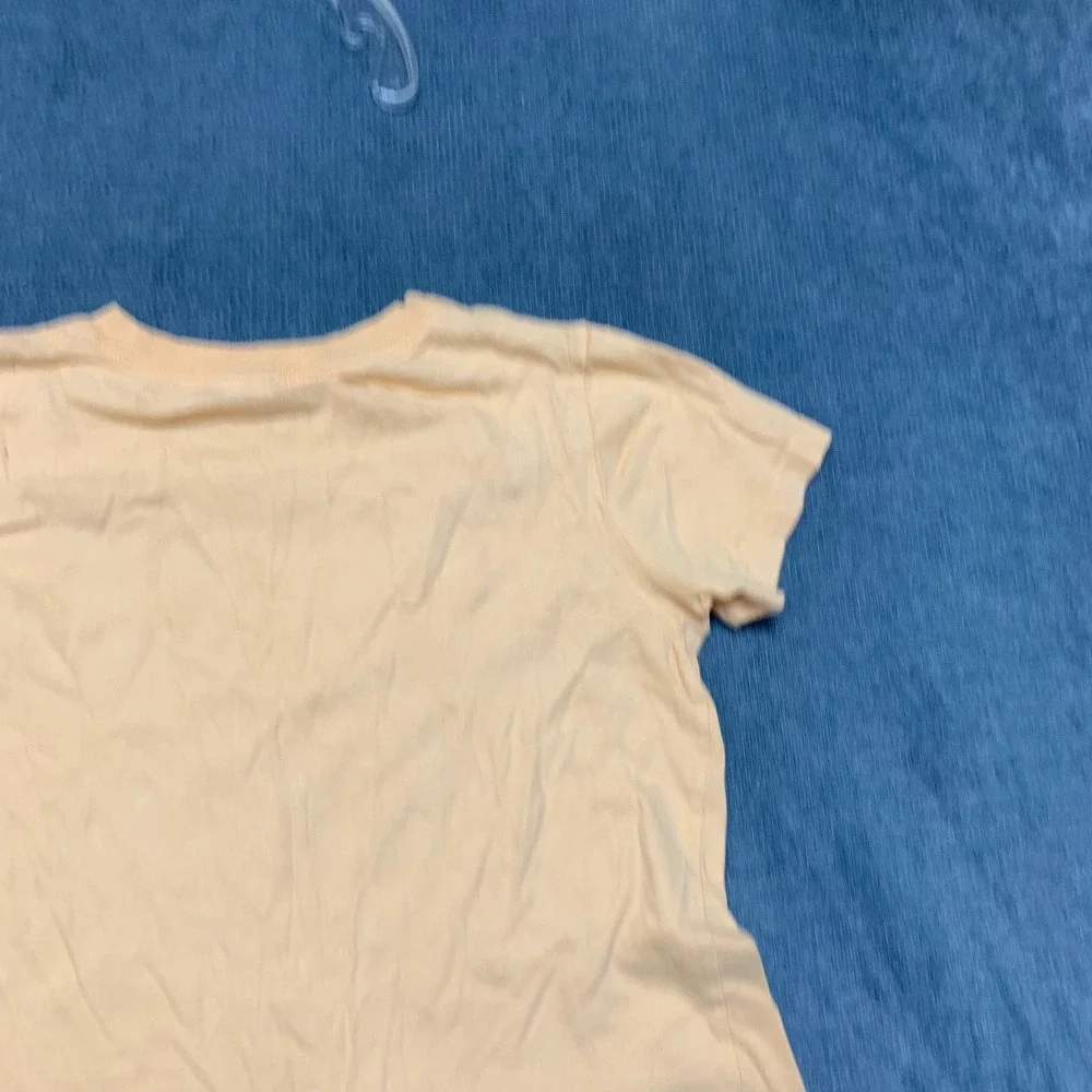 The Nike T Shirt Womens Small Peach Swoosh Logo Crew Neck Short Sleeve Pullover
